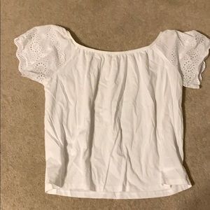 White off the shoulder lace sleeve shirt.